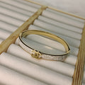 Luxury Interlocking C Bangle: Pave Crystal & Gold Plated Stainless Steel Bracelet for Women - Durable Everyday Wear